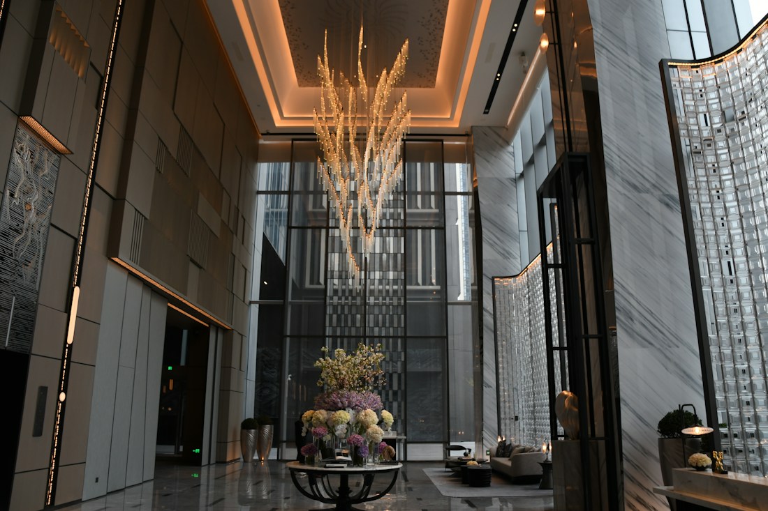 Chandelier and flowers in the Ritz-Carlton Wuhan hotel lobby